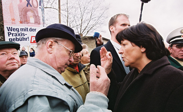 Ulla Schmidt, Federal Minister for Health and Social Affairs, Discusses Health Reform with Demonstrators (February 19, 2004)